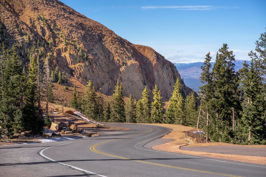 Open road through mountains for RV travel