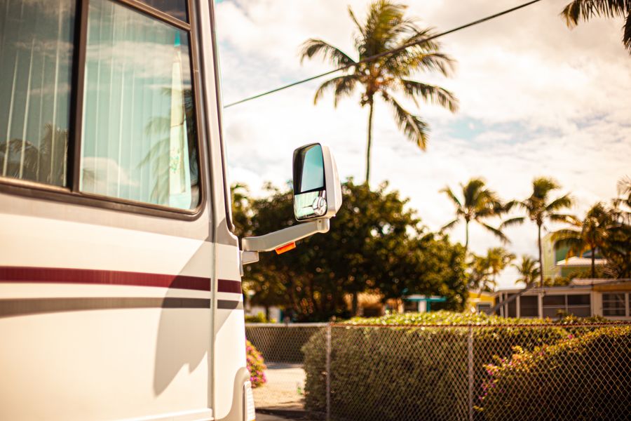 RV parked at a beautiful campsite with hookups